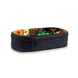 Detailed shot of a black canvas pencil case featuring a colorful Halloween print on top.