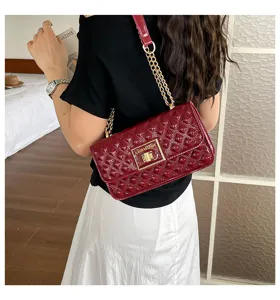 Red patent leather quilted chain shoulder bag, stylish fashion crossbody bag for women.