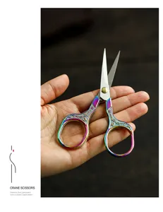 Vintage stainless steel tea scissors with colorful titanium plated finish for Kung Fu tea setup.