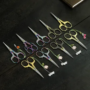 Vintage Chinese tea scissors set retro metal Kung Fu tea accessories with decorative pendants.