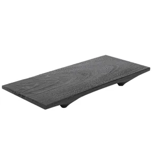 Minimalist black wooden tea tray with four feet, wabi-sabi dry brewing table for home.