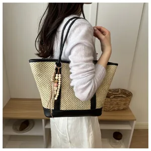 Zomerse strooien shopper voor dames, chic gewoven schoudertas met PU-afwerking en kralen.