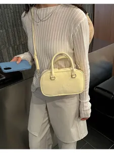Women yellow bowling shoulder bag stylish PU leather handbag daily casual fashion crossbody purse.