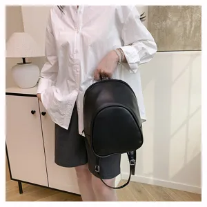 Small black leather casual backpack for women, stylish daily commute travel daypack bag.