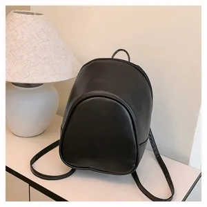 Detail view of black PU leather mini backpack, chic and compact design for daily commuting.
