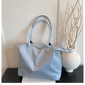 Large capacity travel tote bag, casual lightweight waterproof shoulder handbag for daily use.