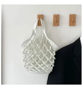Minimalist white leather mesh tote bag, casual lightweight hollow handbag for women.