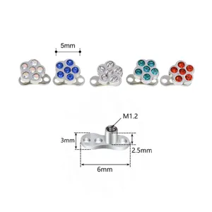 Detailed view of 316L steel flower dermal anchor piercing jewelry with sparkling zirconia stones.