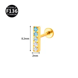 F136 Titanium body piercing labret stud with vertical gradient cubic zirconia stones.