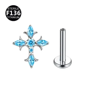 Gioiello per piercing labret croce spina in titanio con zircone cubico blu scintillante.