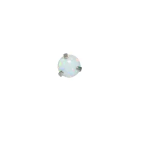 Close-up view of white opal piercing top, shiny prong setting titanium labret accessory.