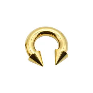 Gold titanium horseshoe piercing ring with sharp cone ends for body piercing body jewelry.