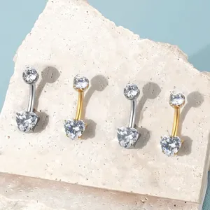 Detail view of F136 titanium heart cubic zirconia navel ring, piercing jewelry set.