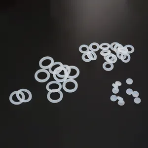 Clear silicone ear backs and O-rings detail, flexible anti-friction jewelry accessories.