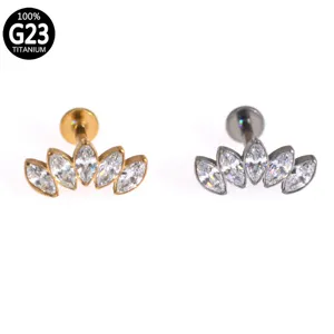 G23 titanium labret piercing jewelry with marquise cubic zirconia cluster studs detail.