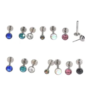 Detail view of body piercing labret studs with colorful zircon stones DIY accessories