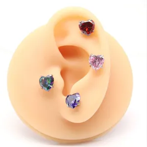Heart shaped cubic zirconia piercing jewelry detail view sparkling crystal body stud accessory