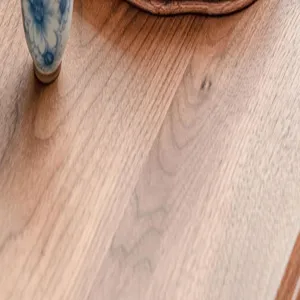 Close up view of natural wood grain texture surface showing fine craftsmanship details.