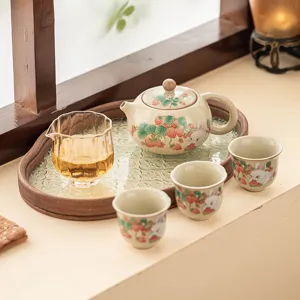 Ceramic kung fu tea set with teapot and three cups, cute strawberry rabbit pattern, home gift.
