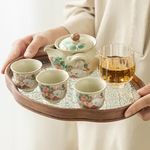Ceramic strawberry rabbit teapot set, kung fu tea set with one pot and three cups for home.