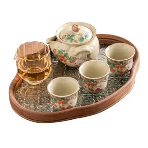 Chinese ceramic kung fu tea set with teapot and cups featuring cute strawberry and rabbit design.