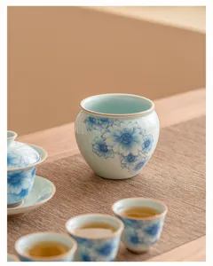 Lave-tasse Jianshui en céramique tournesol bleu et blanc, accessoire de service à thé chinois.
