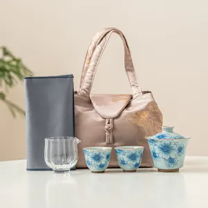 Chinese blue and white ceramic kung fu tea set with gaiwan cups and portable storage bag