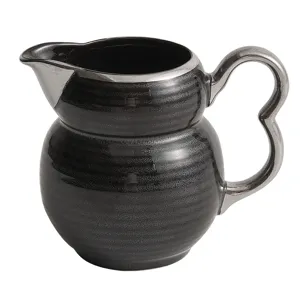 Pot à lait en céramique émail or noir tasse à café avec poignée et bec argentés.