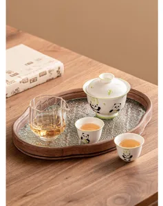 Hand-painted panda ceramic kung fu tea set with gaiwan cups and glass tea tray for two.