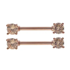 Rose gold tone nipple rings with sparkling champagne cubic zirconia stones piercing.