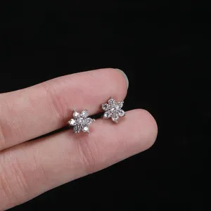 Stainless steel rhinestone flower dermal anchor piercing jewelry detail closeup showcase.