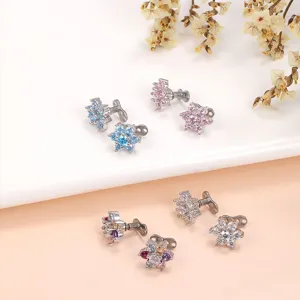 Stainless steel floral dermal anchor piercing jewelry with sparkling multi-stone crystal design.