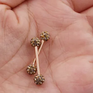 Straight bar body piercing nipple ring with sparkly paved rhinestone mud balls for women.