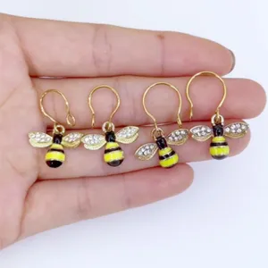 Stainless steel bee earrings detailed view showcasing crystal wings and cute insect design.