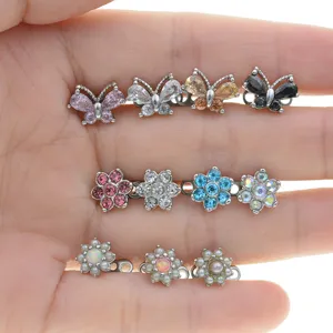 316L stainless steel dermal anchor top piercing jewelry with colorful crystal butterfly and flower designs.