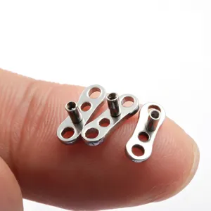 Titanium dermal anchor piercing jewelry detail view, body piercing skin surface anchor.