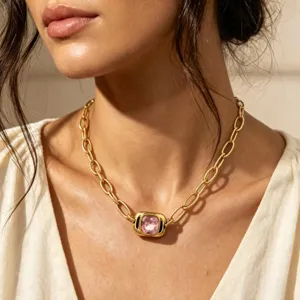 Exquisite gold-tone chain necklace featuring a stunning square pink gemstone centerpiece.