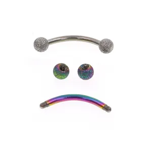 Stainless steel frosted ball eyebrow ring detail, curved barbells and textured spheres.