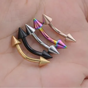 Detailed shot of surgical steel curved barbell body piercing jewelry with spike ends in multi colors.