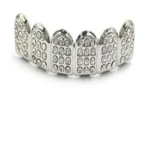 Detail shot of hip-hop silver tone grillz teeth, micro pave rhinestone dental grill decoration.