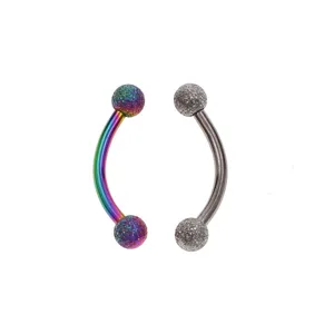 Stainless steel curved barbell eyebrow piercing jewelry detail textured ball ends.