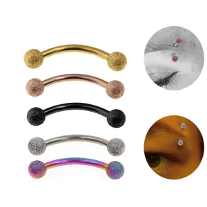 Stainless steel curved barbell eyebrow ring with glitter balls, body piercing jewelry details.