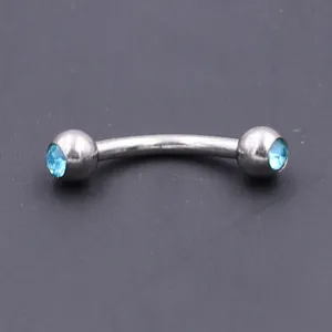 16G stainless steel curved eyebrow ring with blue crystal balls for body piercing detail