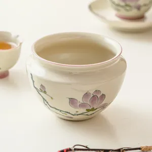 Hand-painted ceramic tea waste jar with magnolia design for Chinese kung fu tea set.