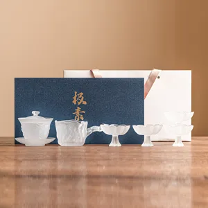 Mat lotus glas kung fu theeset met gaiwan en kopjes in geschenkdoos voor thuisgebruik.
