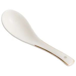 White ceramic soup spoon with elegant gold rim accent and convenient handle hanging hole.