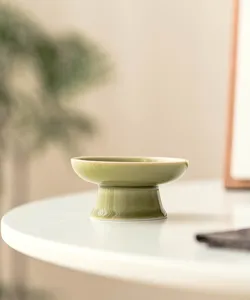 Celadon ceramic high-footed lid rest tea set accessory for traditional tea ceremony detail