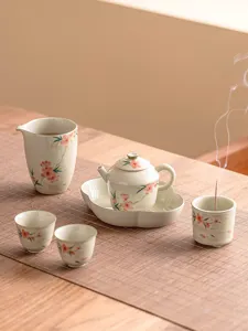 Juego de té Kung Fu de cerámica con flores de durazno pintadas a mano, elegante y útil.