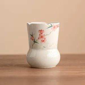 Conteneur à déchets de thé en céramique peinte à la main avec motif de fleurs de pêche.