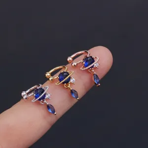 Edelstahl Planet Ohrklemmen mit blauem Zirkon und Tropfenstein für Ohrlöcher ohne Piercing.